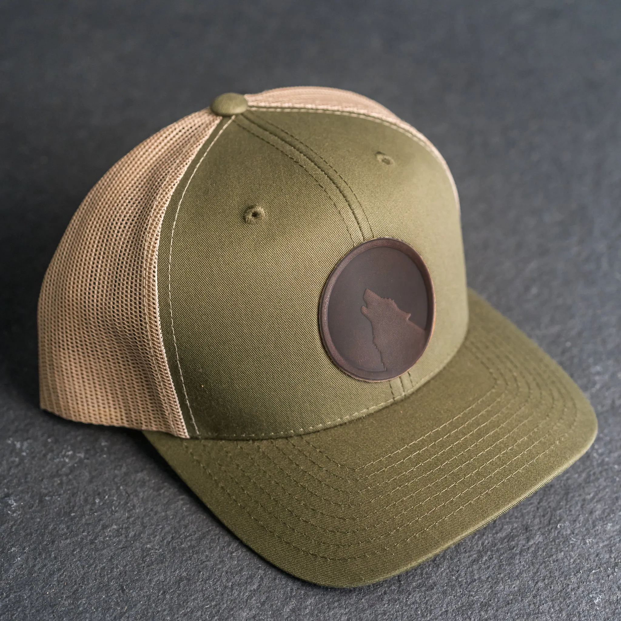 Leather Patch Trucker Style Hat - Wolf Stamp